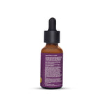 Load image into Gallery viewer, Back label of Serenade Slumber &amp; Shine Night Face Serum showing ingredients including Neroli, Rose, Frankincense and Saffron essential oils for aromatherapy skincare